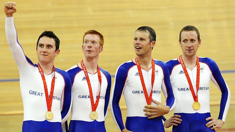 Great Britain's (L to R) Geraint Thomas, Ed Clancy, Paul Manning and Bradley Wiggins with their Gold Medals after winning the Men's Team Pursuit Final at The Laoshan Velodrome during the 2008 Beijing Olympic Games in China.
