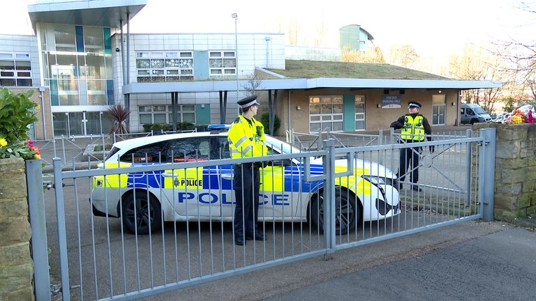 Police officers outside All Saints Catholic High School, on Granville Road in Sheffield.
Pic: PA