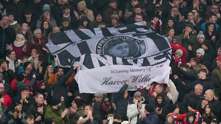 Fans hold up a banner in memory of 15-year-old Harvey Willgoose, who was stabbed to death at All Saints Catholic High School in Sheffield on Monday, during the Sheffield Utd v Portsmouth match at Bramall Lane, Sheffield, on 8 February 2025. Pic: PA