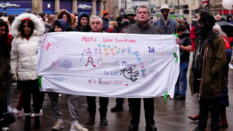 People join the march outside Sheffield Town Hall. Pic: PA