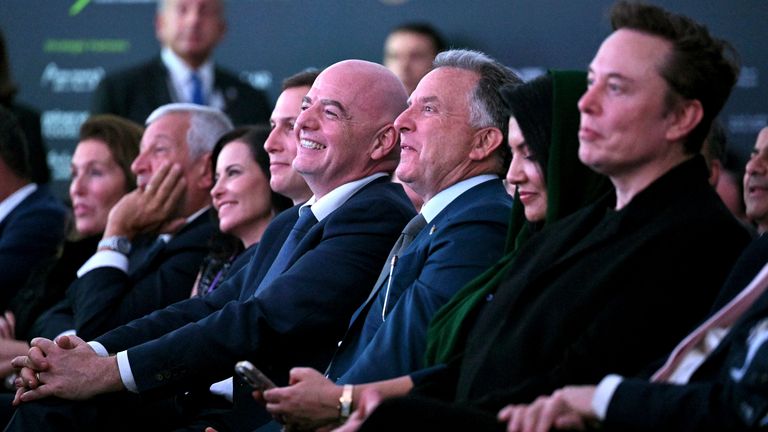 From right, Elon Musk, U.S. special envoy to the Middle East Steve Witkoff, FIFA President Gianni Infantino and Jared Kushner listen as President Donald Trump speaks at the Future Investment Initiative (FII) Institute summit in Miami Beach, Fla., Wednesday, Feb. 19, 2025. (Pool via AP)