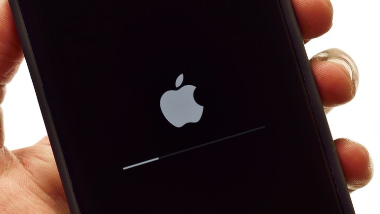 Software updating in apple iphone in hand