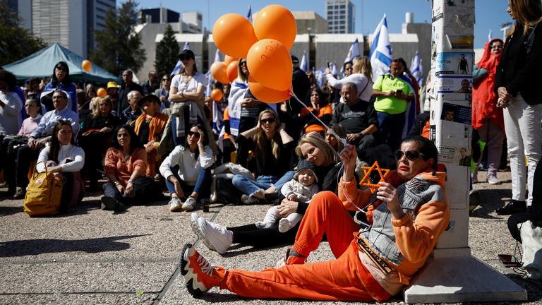 The colour orange has become a symbol of the Bibas family. Pic: Reuters