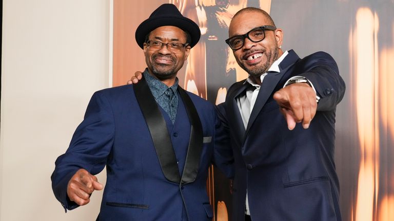 John Divine G Whitfield, left, and Clarence Maclin at the Oscar nominees dinner in Los Angeles. Pic: Jordan Strauss/Invision/AP