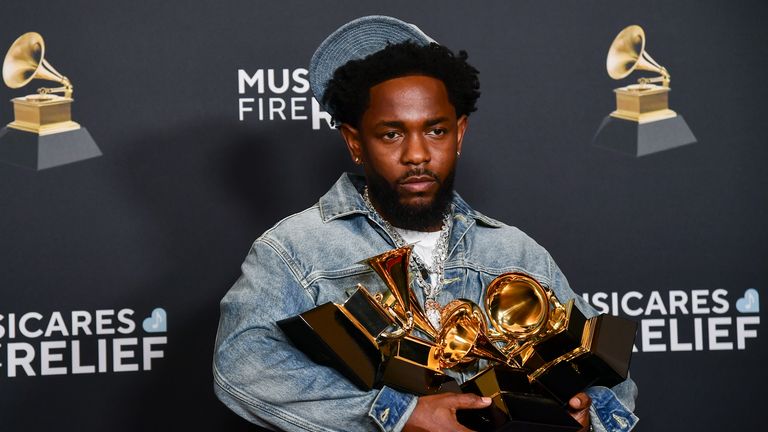 Kendrick Lamar poses in the press room with the award for record of the year, best rap performance, best rap song, best music video and song of the year during the 67th annual Grammy Awards on Sunday, Feb. 2, 2025, in Los Angeles. (Photo by Richard Shotwell/Invision/AP)