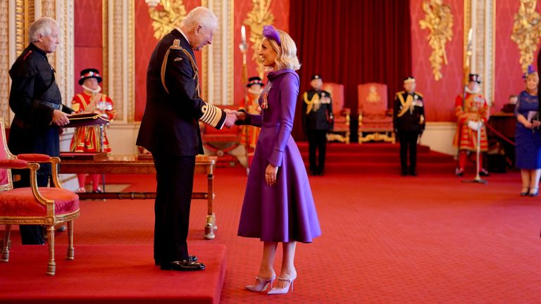 Amy Dowden and King Charles during her Investiture at Buckingham Palace. Pic: PA