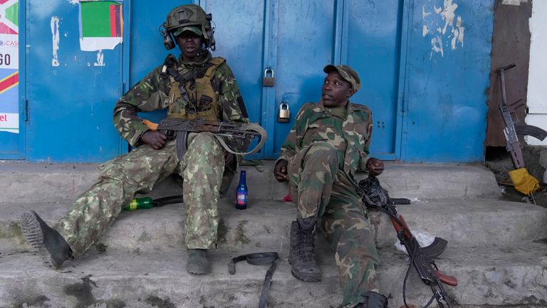 M23 rebels on the streets of Goma.
Pic: AP/Brian Inganga