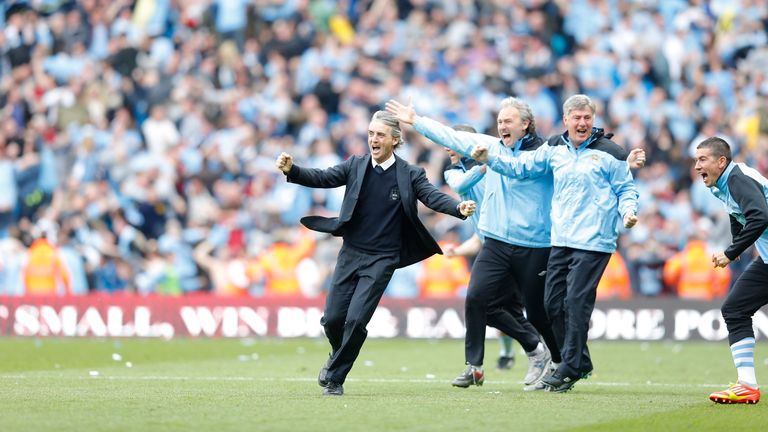 Man City manager Roberto Mancini celebrates Sergio Aguero's winning goal against QPR that clinched the Premier League title in May 2012. Pic: Reuters