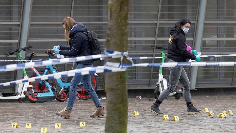 Members of the forensic police work at the Clemenceau metro station.
Pic: Reuters