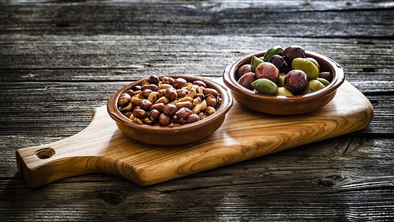 Peanuts and olives have become more common in pubs. Pic: iStock