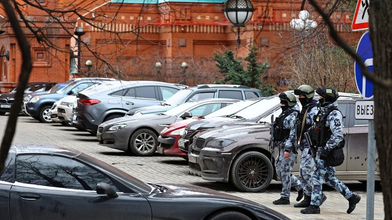 Officers patrol near the site of the blast. Pic: Reuters