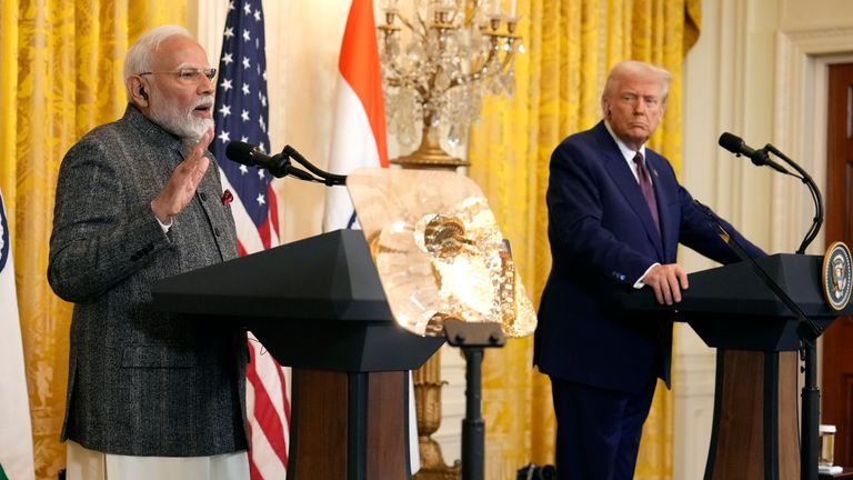 India's Prime Minister Narendra Modi speaks as President Donald Trump listens during a news conference in the East Room of the White House, Thursday, Feb. 13, 2025, in Washington. (AP Photo/Ben Curtis)