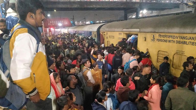 Passengers jostle with each other to board a train at the New Delhi Railway station, in New Delhi, India, Thursday, Feb.15, 2025. Pic: AP