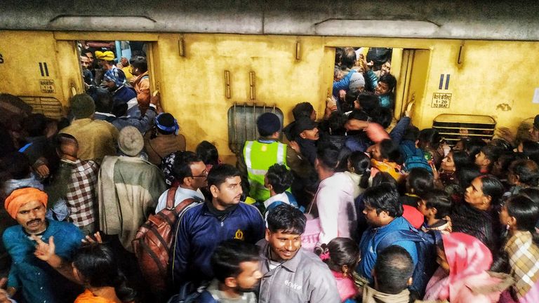 Passengers jostle with each other to board a train at the New Delhi Railway station, in New Delhi, India, Thursday, Feb.15, 2025. Pic: AP