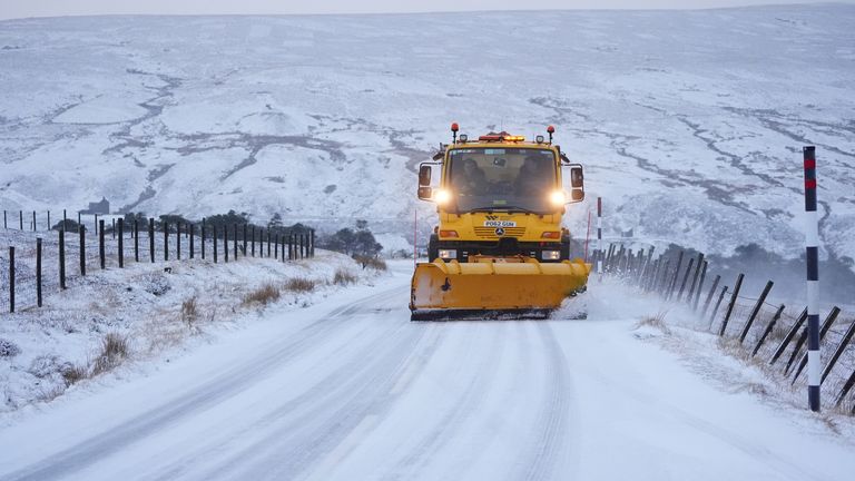 A plough clears the snow near Nenthead in Northumberland.
Pic: PA