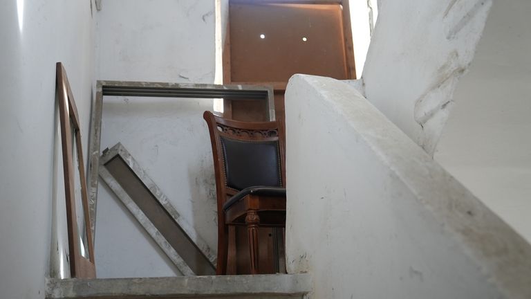 Upstairs from Qasam's flat, the IDF have set up a sniper position, two holes for the barrel of a gun through a piece of plywood