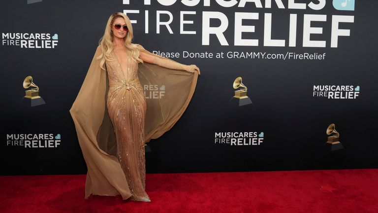 Paris Hilton in gold. Pic: AP