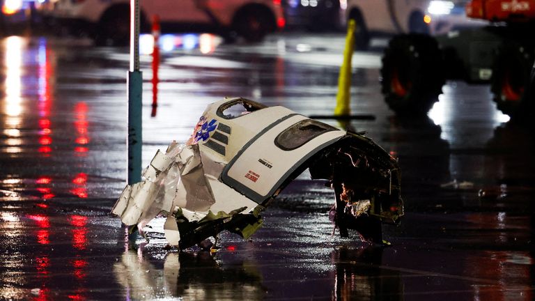 Debris of the aircraft lies on the ground at the site of a plane crash in Philadelphia, Pennsylvania, U.S., January 31, 2025. REUTERS/Rachel Wisniewski TPX IMAGES OF THE DAY