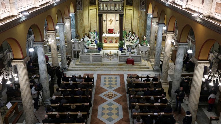 Argentine community members gather to pray for Pope Francis, at Santa Maria Addolorata, as Pope Francis continues his treatment at Gemelli Hospital, in Rome, Italy, February 25, 2025. REUTERS/Hannah McKay