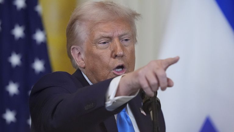 President Donald Trump takes questions during a news conference. Pic: AP