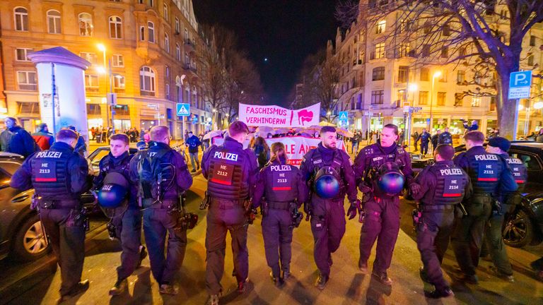 Protests broke out after the exit poll showed the AfD was set to be the second-largest party in Germany. Pic: AP