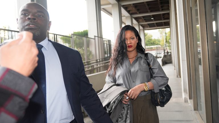 Rihanna arrives at court for the verdict of A$AP Rocky's trial on 18 February.
Pic: AP/Damian Dovarganes)