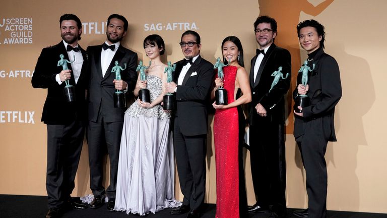 Tommy Bastow, from left, Shinnosuke Abe, Moeka Hoshi, Hiroyuki Sanada, Anna Sawai, Tadanobu Asano, and Hiroto Kanai, winners of the award for outstanding performance by an ensemble in a drama series for "Shogun," pose press room during the 31st annual Screen Actors Guild Awards on Sunday, Feb. 23, 2025, at the Shrine Auditorium in Los Angeles. (Photo by Jordan Strauss/Invision/AP)