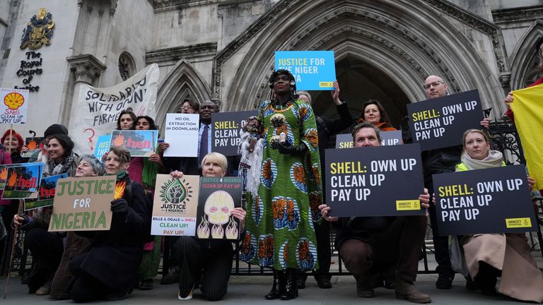 Activists stage an 'Ecocide Babe' stunt outside The Royal Courts Of Justice, central London where the Ogale and Bille communities vs Shell hearing is taking place. Picture date: Thursday February 13, 2025.

