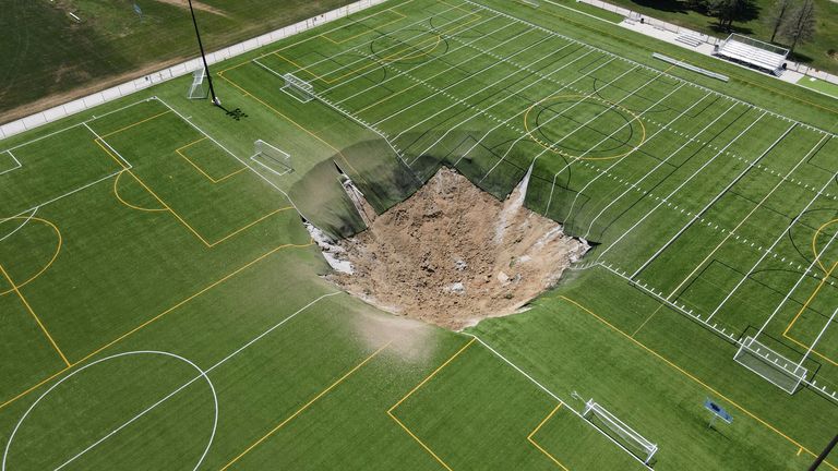 A drone view shows a sinkhole that formed on a turf soccer field at Gordon Moore Park in Alton, Illinois, U.S., June 27, 2024. REUTERS/Lawrence Bryant TPX IMAGES OF THE DAY