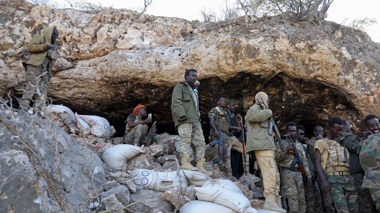 Security forces gather after capturing an ISIS base. Pic: Feisal Omar/Reuters