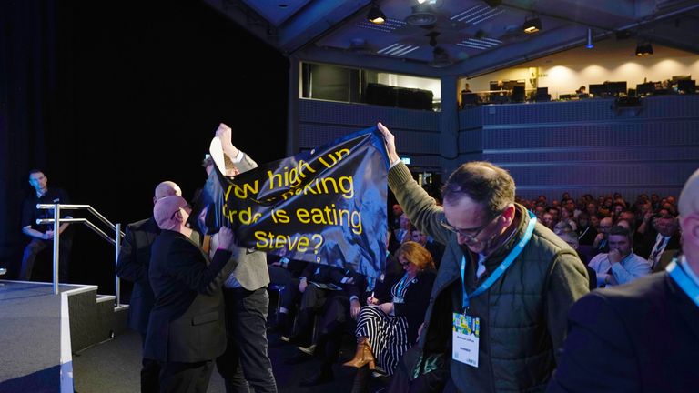 Protesters interrupt environment secretary's speech to farmers' conference