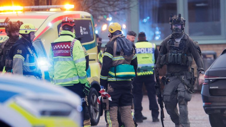 Emergency services at the scene of an incident at Risbergska School, in Örebro, Sweden. Pic: TT News Agency via AP