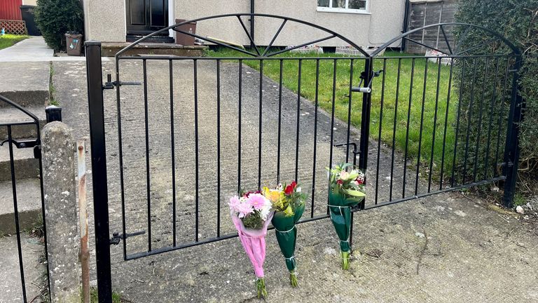 A general view of floral tributes left near the scene on Cobhorn Drive, Hartcliffe, Bristol, where a 19-year-old woman died after she was attacked by a dog on Wednesday night. A man and a woman, both aged in their 20s, have been arrested on suspicion of being in charge of a dog dangerously out of control causing injury resulting in death and possession of a prohibited breed of dog, as the dog responsible for the attack is believed to have been an XL bully. Picture date: Thursday February 27, 2025. PA Photo. See PA story POLICE Dog. Photo credit should read: Rod Minchin/PA Wire