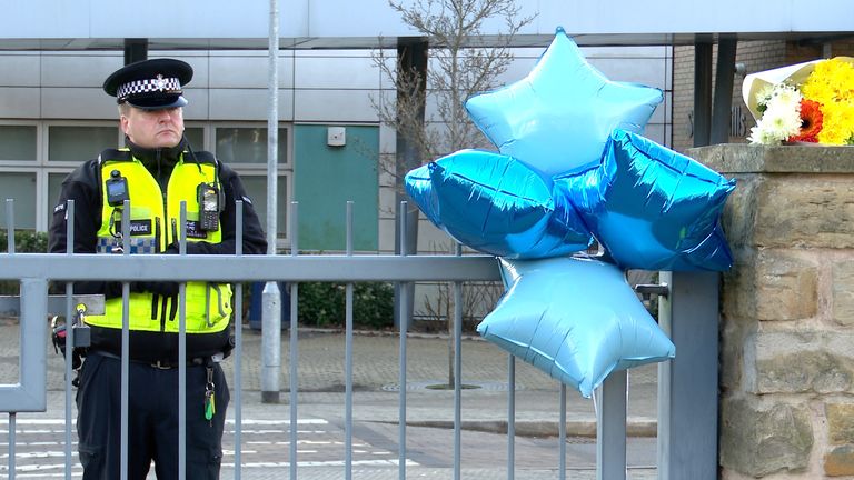 Tributes left outside All Saints Catholic High School, on Granville Road in Sheffield.
Pic: PA