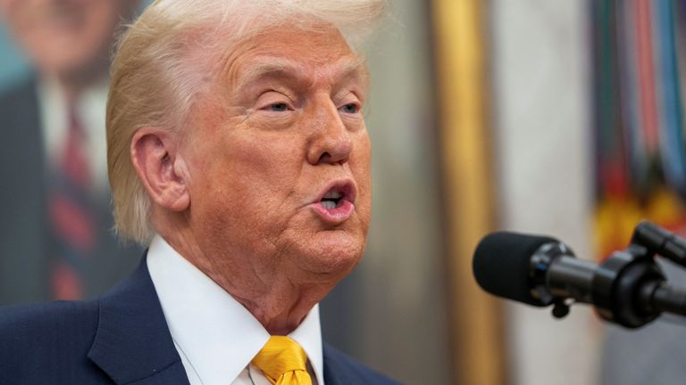 President Trump speaks in the Oval Office on Friday. Pic: Reuters