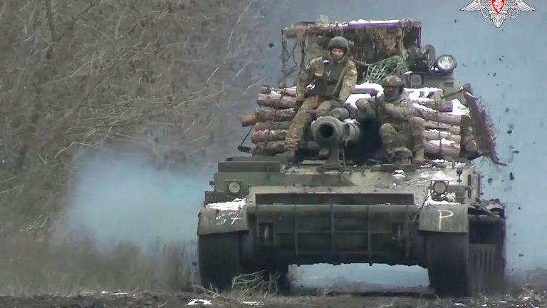 Russian soldiers ride atop Akatsyia self-propelled gun on an undisclosed location in eastern Ukraine.
Pic: Russian Defence Ministry Press Service/AP