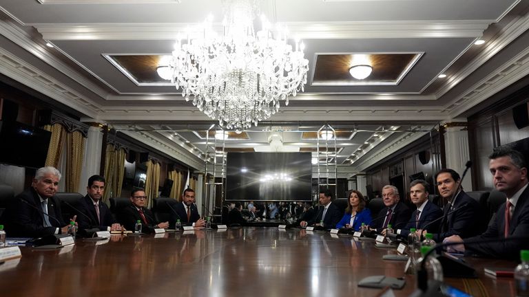 US secretary of state Marco Rubio, second right, meets with Panamanian President Jose Raul Mulino, left.
Pic: AP/Mark Schiefelbein