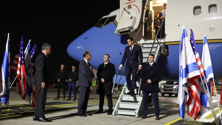 US Secretary of State Marco Rubio arrives in Israel on the first leg of his Middle East trip, as Israel's Foreign Minister Gideon Sa'ar waits to welcome him, in Tel Aviv, Israel, February 15, 2025. REUTERS/Evelyn Hockstein/Pool TPX IMAGES OF THE DAY