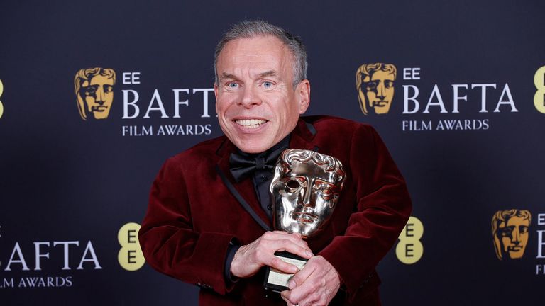 Warwick Davis was given the BAFTA fellowship award. Pic: Joel C Ryan/Invision/AP