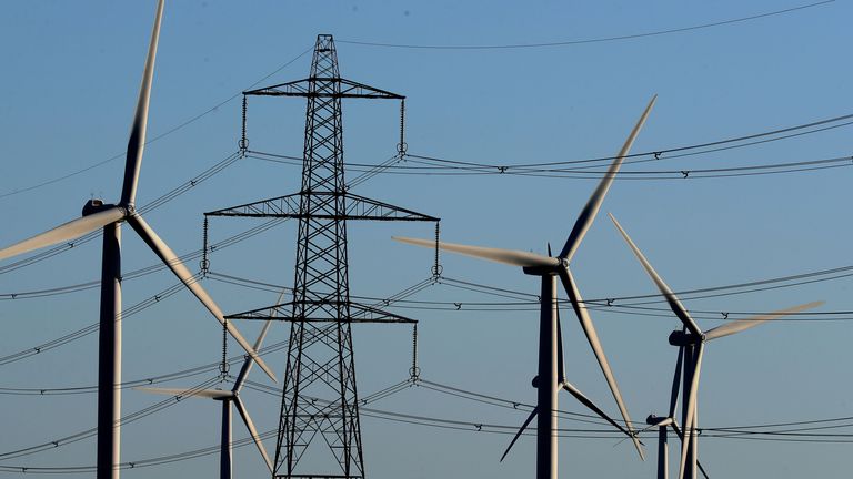 File photo dated 28/12/17 of a view of the Little Cheyne Court Wind Farm amongst existing electricity pylons on the Romney Marsh in Kent. Officials have unveiled plans to connect new wind and solar farms to the power grid faster, which they hope will end years of gridlock for some projects. Issue date: Friday February 14, 2025.    MIME type:  image/jpeg  Width:  3000  Height:  1803  Copyright holder:  Gareth Fuller/PA Wire  Copyright notice:  © 2025 PA Media, All Rights Reserved  Usage terms:  FILE PHOTO  Pic