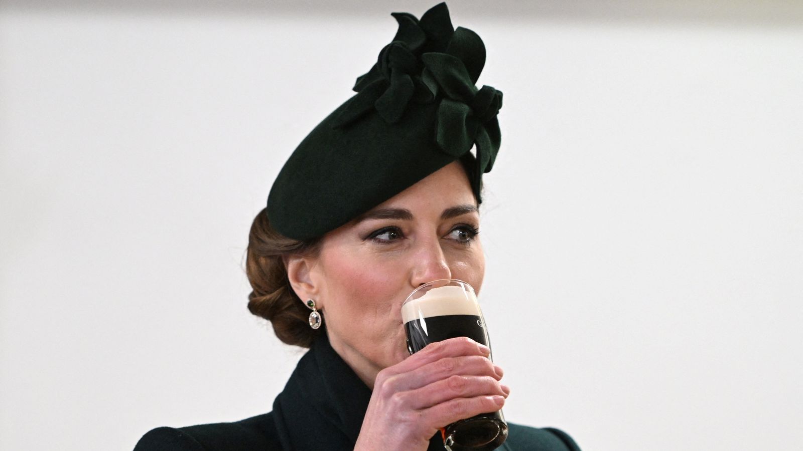 Kate, Princess of Wales enjoys Guinness at St Patrick's Day event - and buys round of drinks for troops