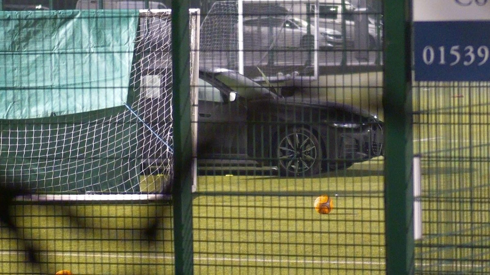 Child dies and another injured after car driven on to sports pitch