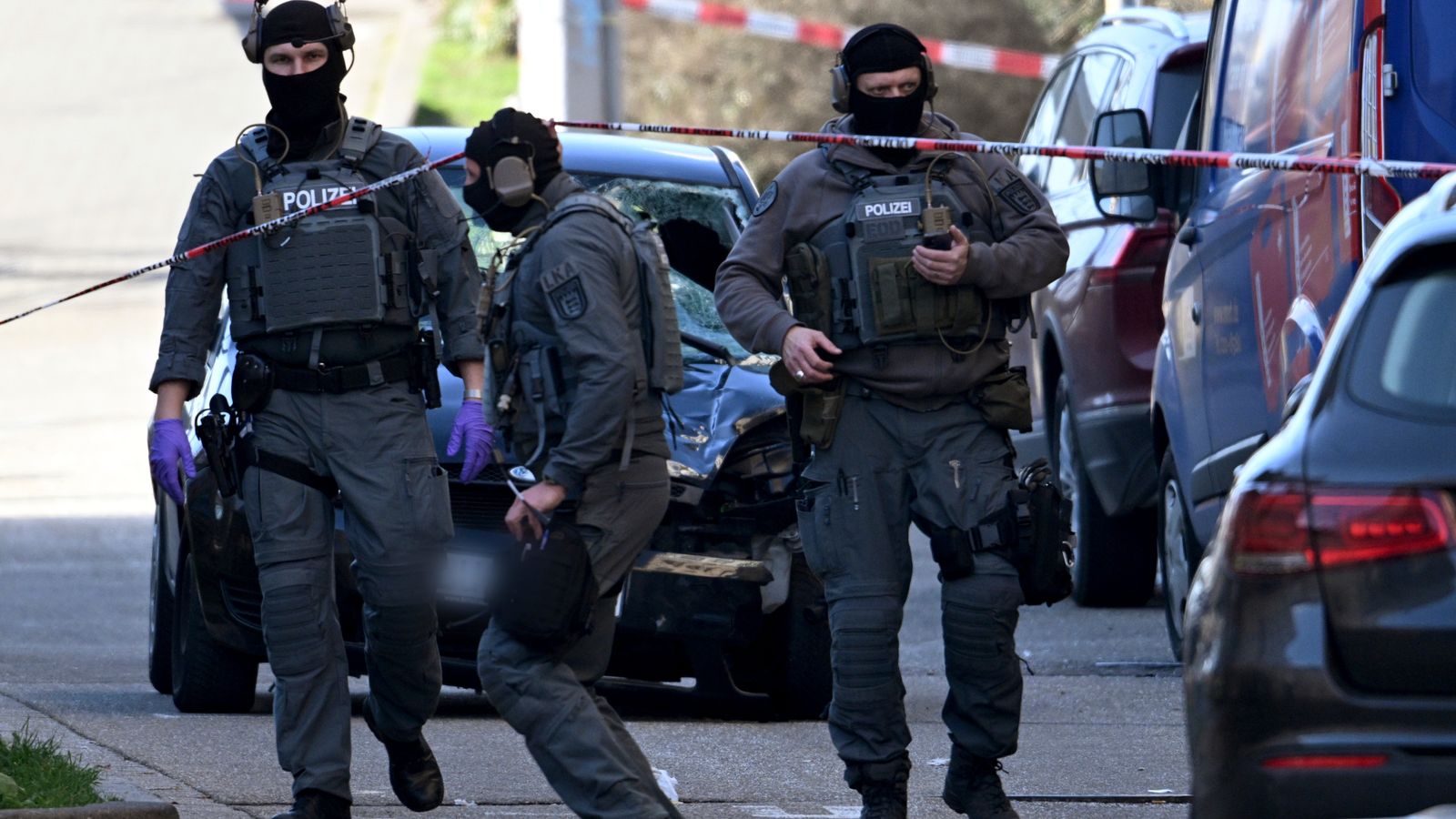 Driver Rames Two dead, 11 injured, as driver rams car into crowds then shoots ...