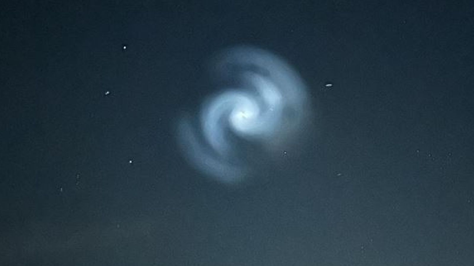 Glowing spiral appears in night sky as Met Office reveals likely cause