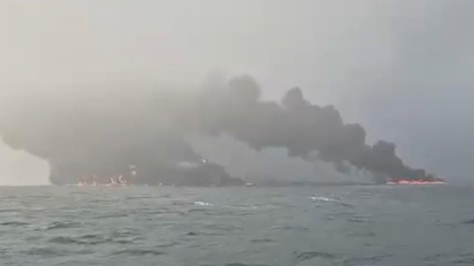 Billowing smoke and fire after oil tanker and cargo ship collision in North Sea