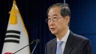 South Korean acting President Han Duck-soo speaks during a briefing at the Government Complex in Seoul, South Korea, Monday, March 24, 2025. Ahn Young-joon/Pool via REUTERS