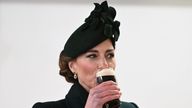 Britain's Catherine, Princess of Wales, drinks a beverage on the day of the Irish Guard's St. Patrick's Day Parade at Wellington Barracks in London, Britain, March 17, 2025. Eddie Mulholland/Pool via REUTERS