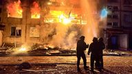 Firefighters put out a fire following a Russian rocket attack in Dobropillya, Donetsk region, Ukraine. Pic: Ukrainian Emergency Service via AP