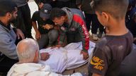 Palestinians mourn their relatives who were killed by an Israeli airstrike in Beit Lahiya. Pic: AP