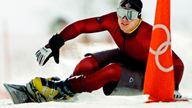 Ryan Wedding of Canada takes a practice run for the men's parallel.giant slalom of the Salt Lake 2002 Winter Olympic Games .
Pic: Reuters